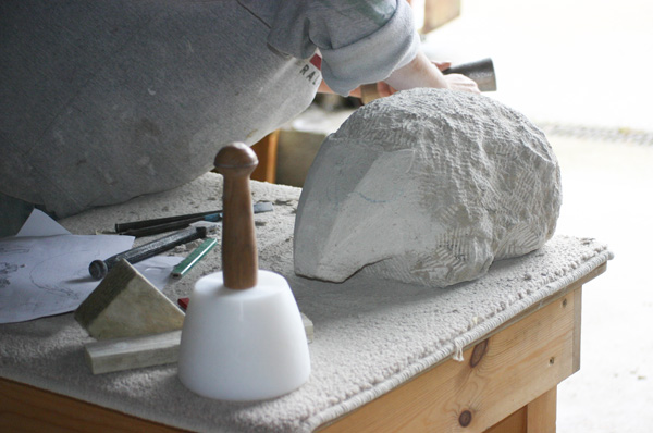 Carving a Badger in stone