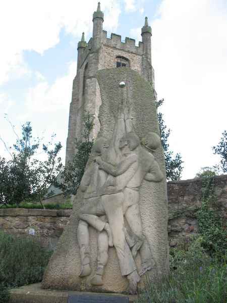 Stone Sculpture showing Shrove Tuesday ball game