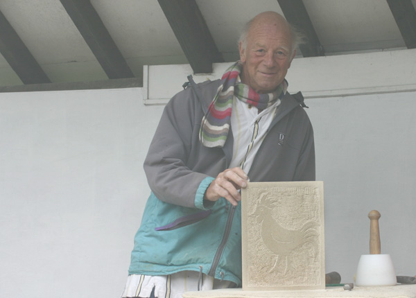 Relief carving of a Cockerel