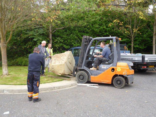 stone block being put in position