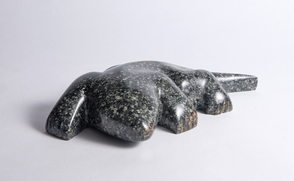 Lizard stone sculpture