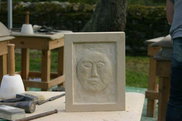 face stone carving