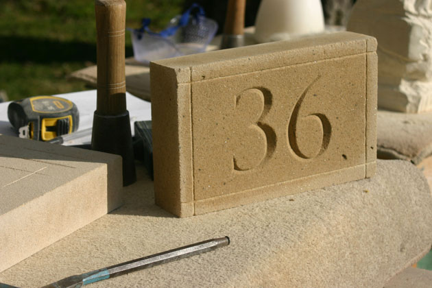 stone carved letters