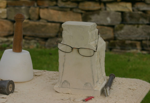 owl stone carving