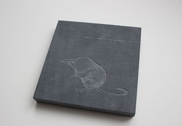 Slate carving of a shrew