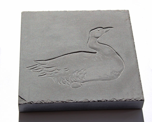 Slate tile carved with a goose