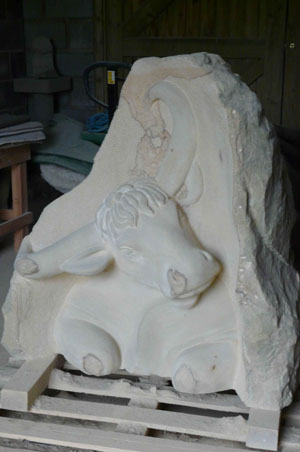 Aurochs sculpture finishing the surface
