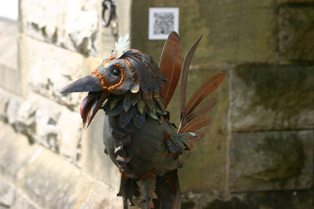 Metal bird sculpture