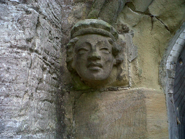 stone carved head
