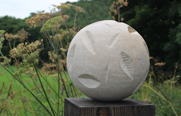 Gold leaf carved on stone ball
