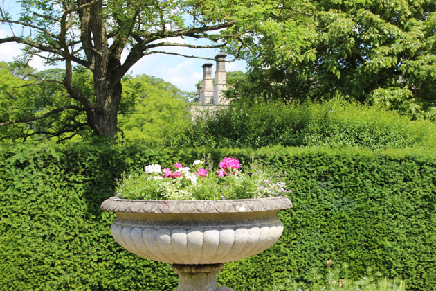 Planted urn in the garden at Nunnington Hall