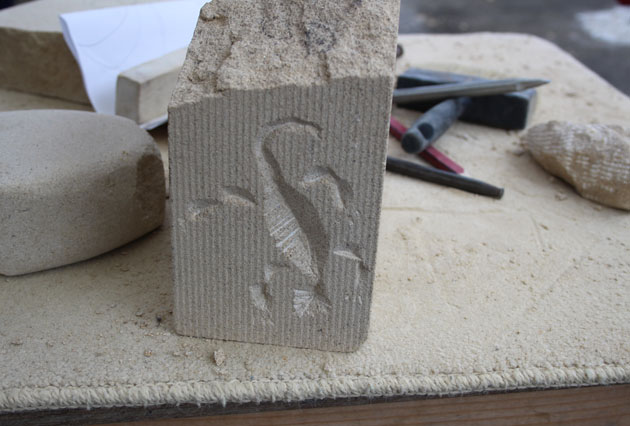 small lizard carving