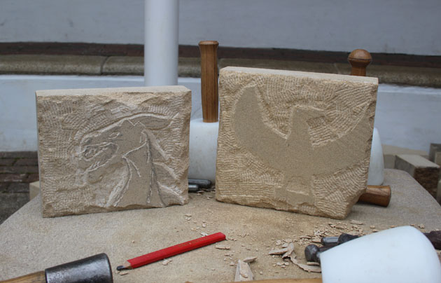 Stone carving of a dragon and a bird