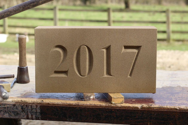 Incised lettering date stone 2017