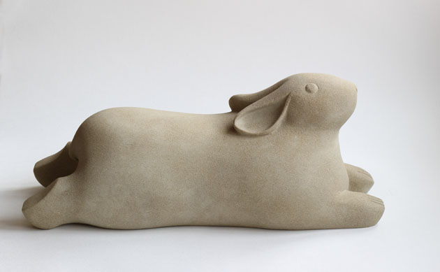 Recumbent Rabbit stone sculpture
