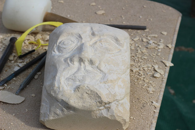 Face carved during the stone carving course