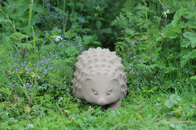 Hedgehog sculpture carved in sandstone