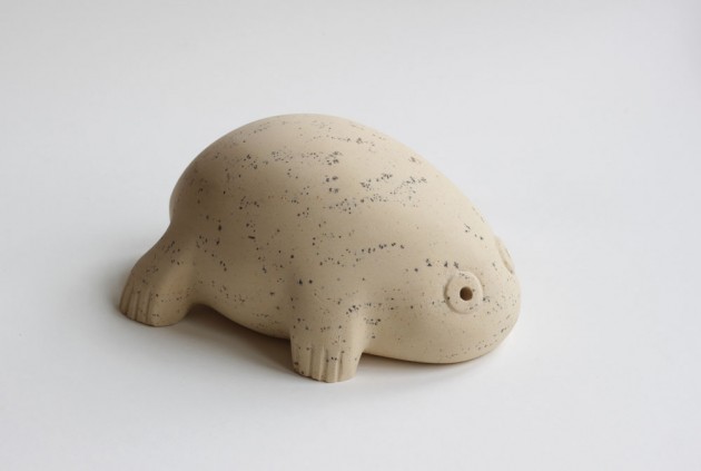 Froglet sculpture carved in stone