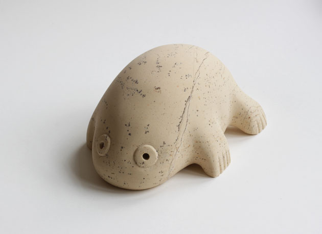 Froglet stone sculpture