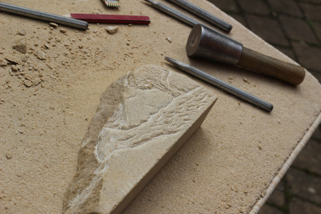 stone carving landscape with river