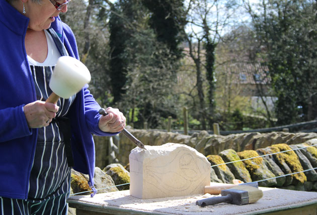 Carving begins on the stone carving course