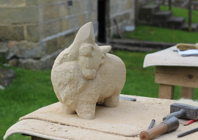 Highland bull being carved