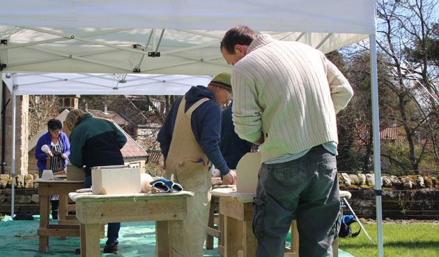 group of stone carvers