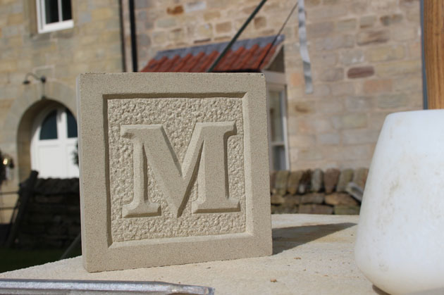 relief carved letter