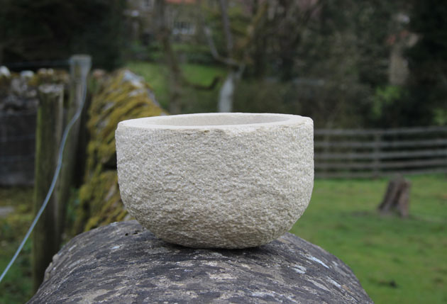 stone bowl with textured surface