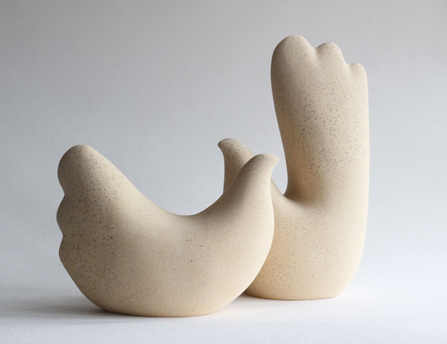 Twosome bird sculpture in limestone