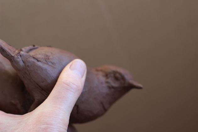 A clay maquette in preparation for a bird stone sculpture