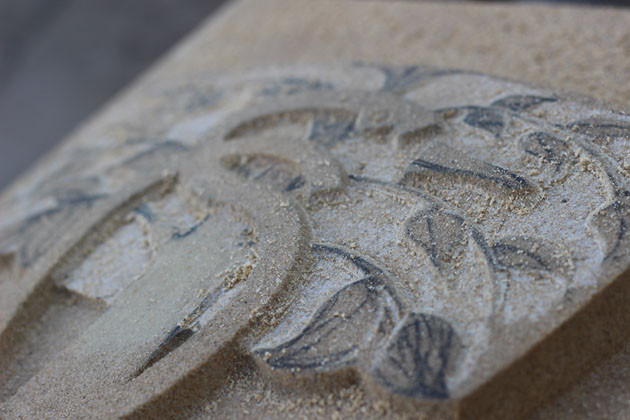 Carving leaves in stone