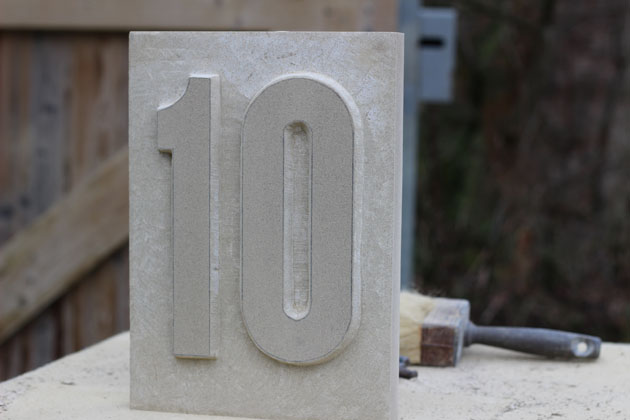 Stages of relief carving numbers