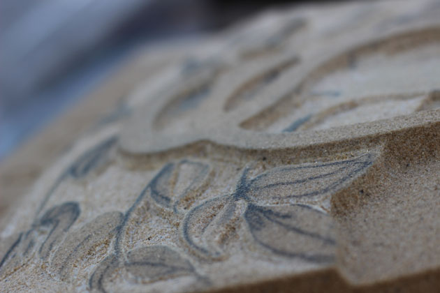 relief carving leaves in stone