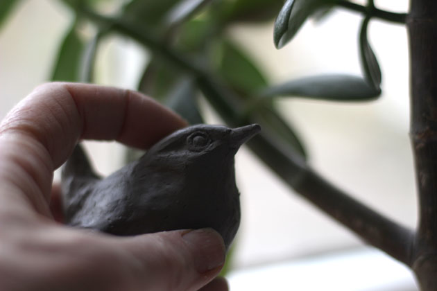 Wren modelled in clay