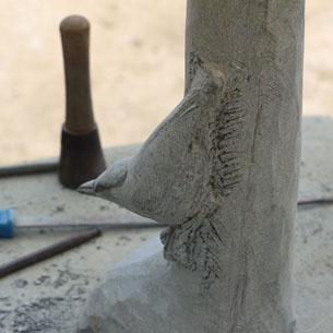 Bird carving in stone