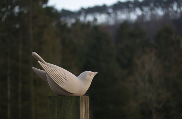 Bird sculpture carved in stone