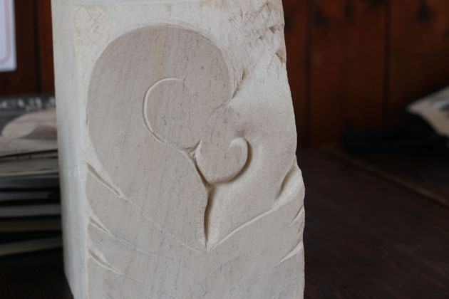 koru carving in stone