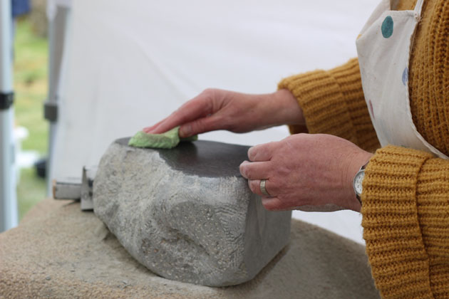 polishing the stone surface