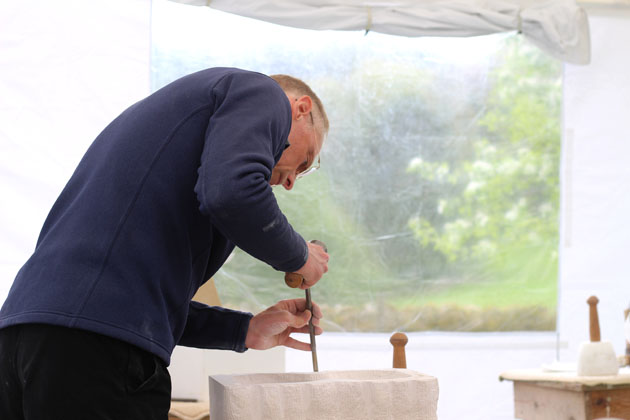 concentrating on stone carving