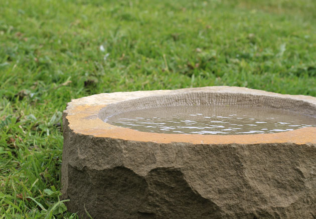 Natural stone birdbath