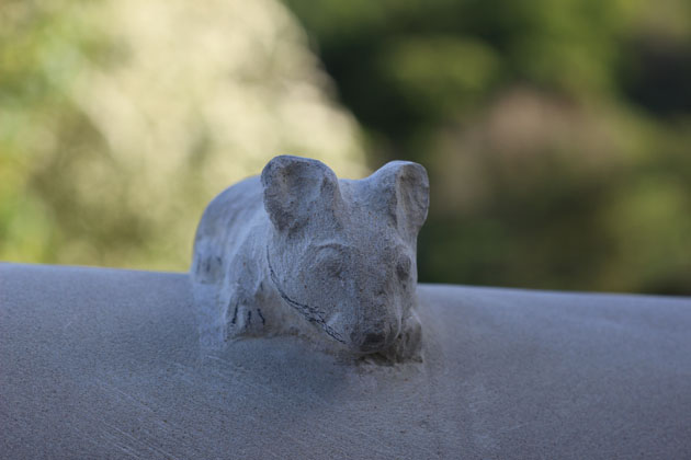 stone carving of a mouse