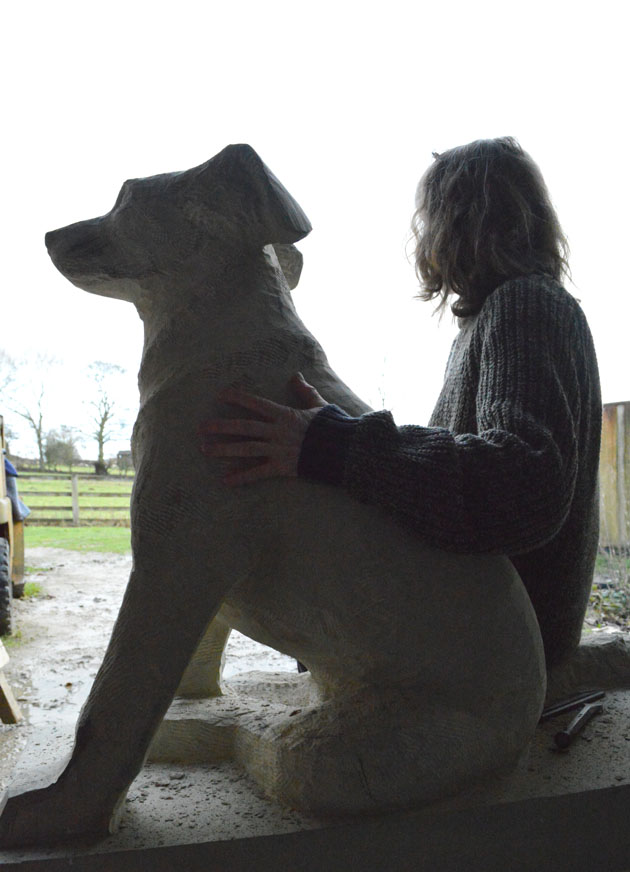 Sitting dog sculpture