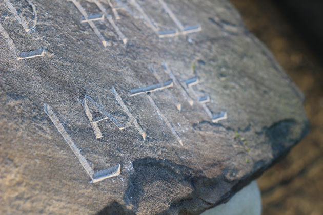 Carving letters in stone