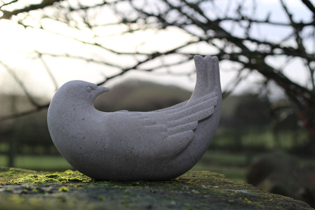 Upside Down Bird stone sculpture