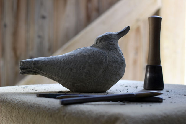 Carving a Lapwing sculpture