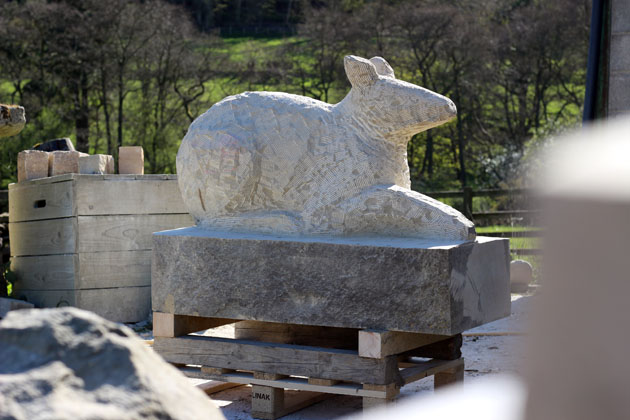 moving a stone sculpture