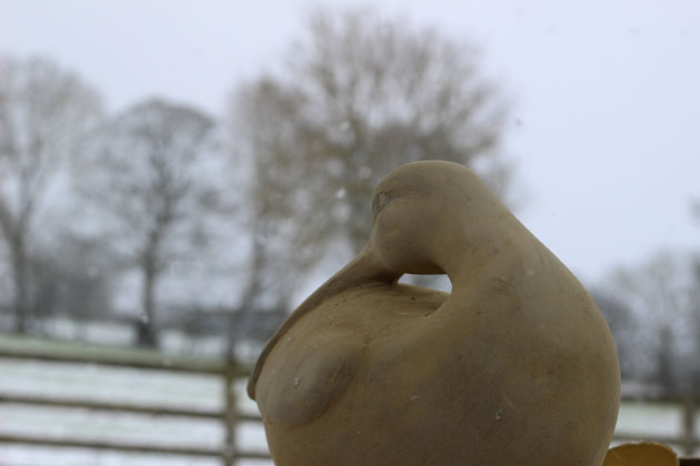 Carving a Curlew sculpture