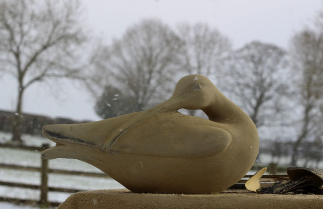 Carving a Curlew in the snow