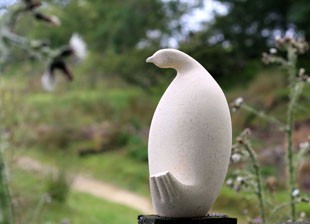 Four Feathered bird sculpture